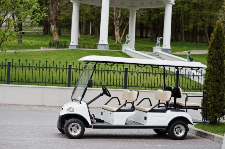 photo tiny golf car standing yard